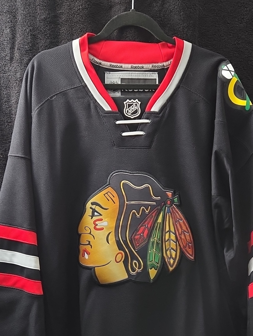 Reebok Black Chicago Blackhawks Jersey with Red and White Accents